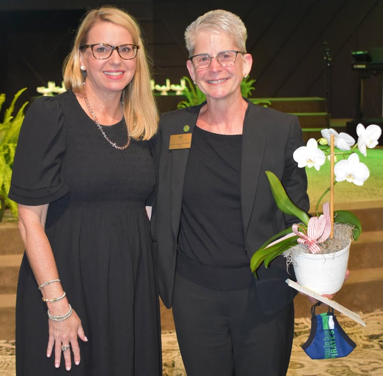 Nursing instructor farewell event at Pensacola State College with retired U.S. Navy Reserve Capt. Ka.