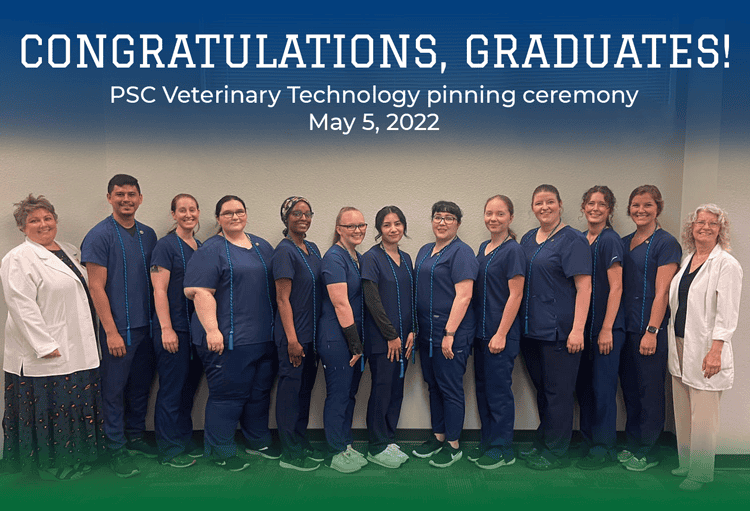 Group of students earning Veterinary Technology vocational pins at Pensacola State College graduatio.