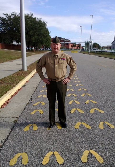 decorative image of 1STSGT-HELFERT-ON-FOOTPRINTS-1 , Retired Marine is a Veterans Upward Bound success story &ndash; and now a Veterans Upward Bound recruiter 2022-06-08 13:26:16