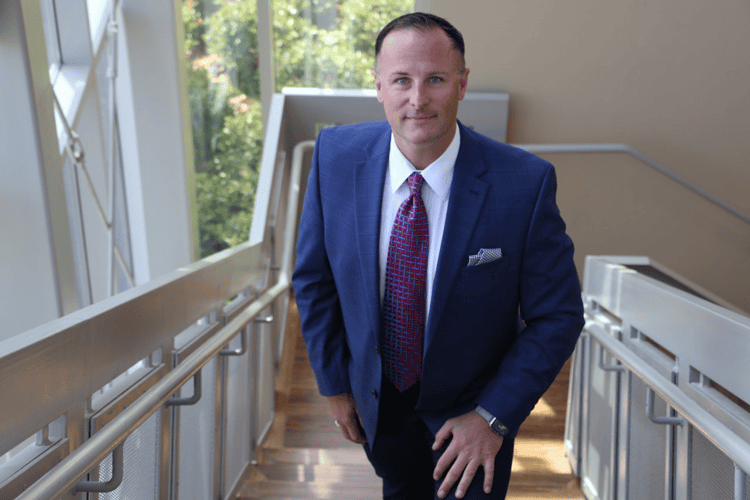 Jon Stephenson, college administrator, in a professional portrait at Pensacola State College.
