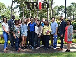 Diverse group of students and staff at Pensacola State College for TRIO Educational Opportunity Cent.