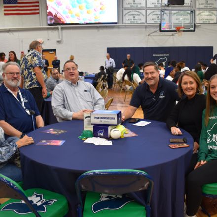 Pensacola State College athletics campaign team at Pirate Experience event.