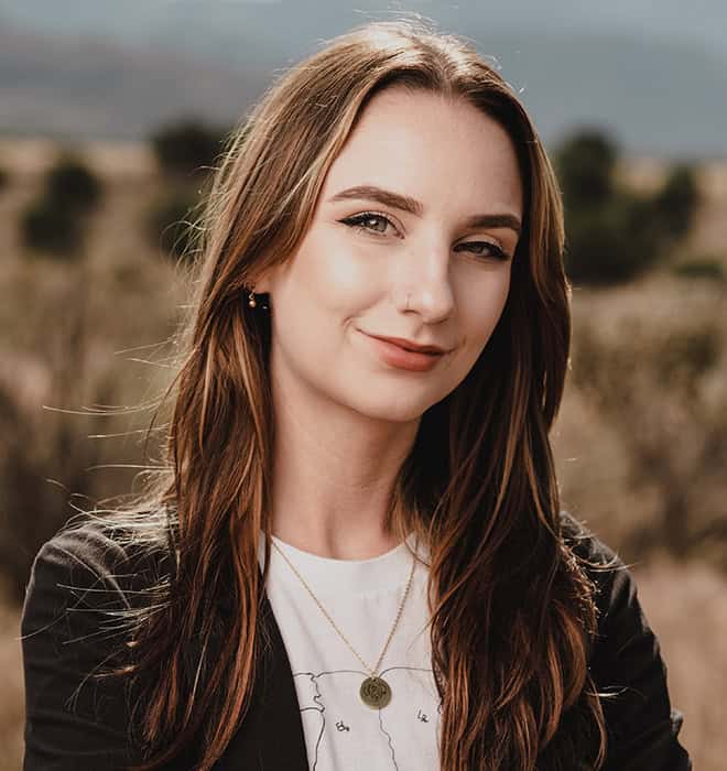 Alumna Kristian Breeze, a PSC graduate, now works as a talented graphic artist at the Georgia O&rsquo;Keef.