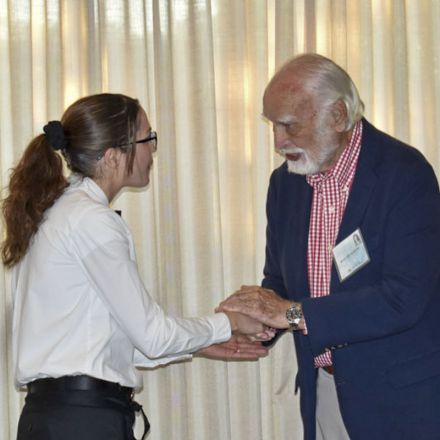 Molly McGuire scholarship recipient receiving award at Pensacola State College event.