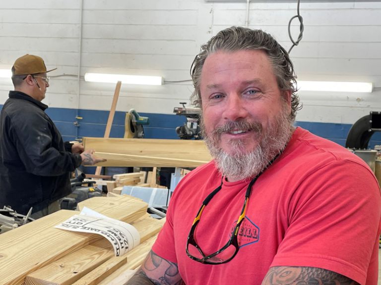 Retired U.S. Navy diver now leads PSC Carpentry program, promoting skilled trades education.