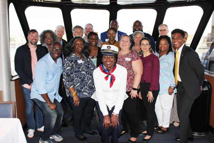 Highly engaged group of Pensacola State College students and faculty celebrating AFC chapter recogni.