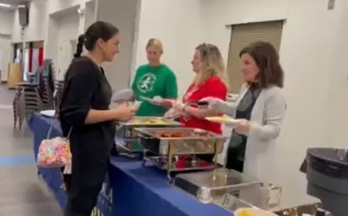 Students enjoy pancakes, eggs, bacon, and sausage during finals week at Pensacola State College.