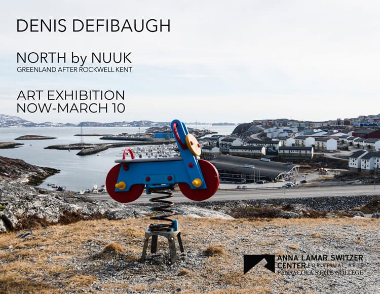 Vibrant outdoor art piece overlooking Nuuk's harbor and urban landscape in Greenland.