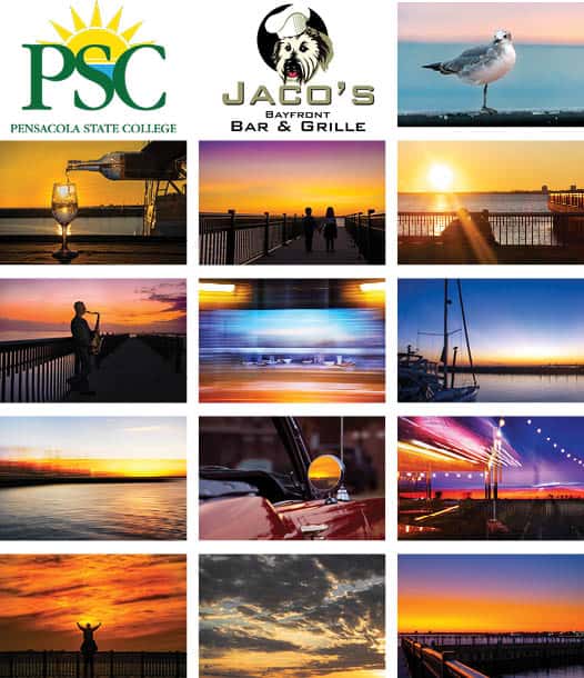 Vibrant sunset over Pensacola Bay with silhouettes of people and boats, showcasing scenic coastal vi.