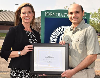 Steinway Piano Award presented to Pensacola State College adjunct professor Benjamin Rollings.