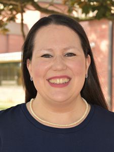 Portrait of a smiling instructor at PSC Academy of Teaching Excellence.