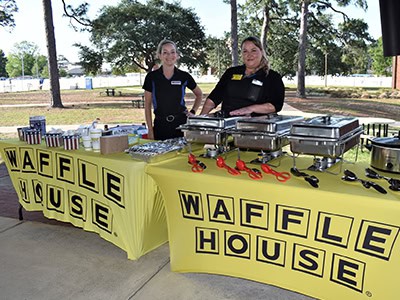 High school students enjoying Waffle House breakfast during Finals Week at Pensacola State College.