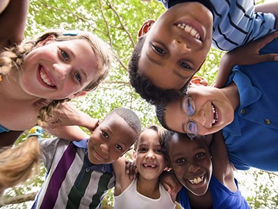 Children enjoying outdoor activities at Pensacola State College during Kids College summer program.