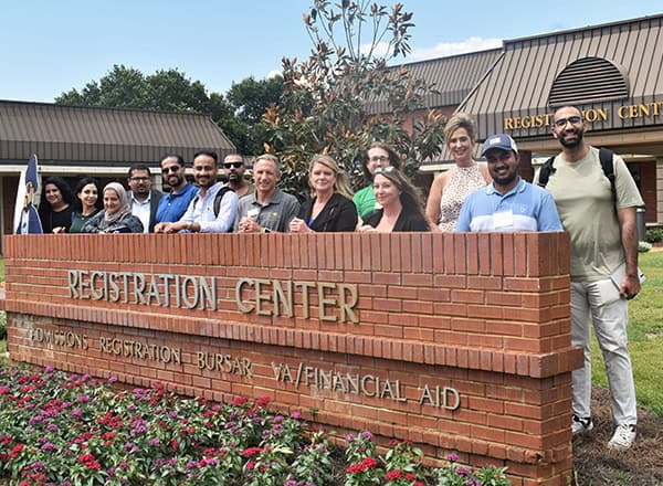 Bahrain delegation touring Pensacola State College's registration center for workforce training prog.