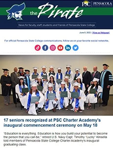 Graduates in caps and gowns with faculty and officials at PSC graduation event.
