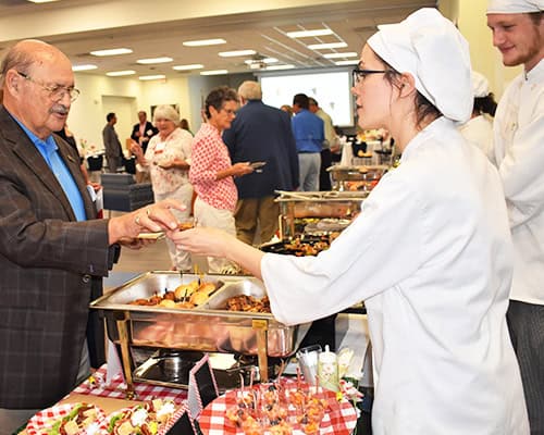 Diverse international appetizers served to Pensacola State College supporters and donors at Garde Ma.
