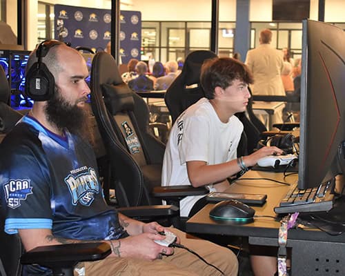 ESports team players competing in a gaming tournament at Pensacola State College.