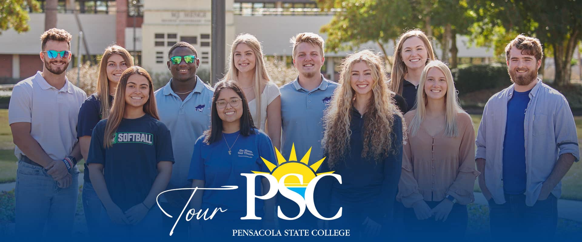 Diverse group of students participating in campus tour at Pensacola State College, showcasing higher.