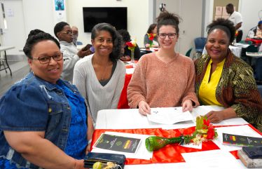 Diverse students and faculty celebrating Black History Month at Pensacola State College.