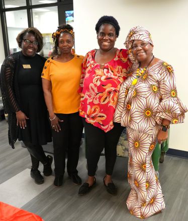 Diverse group of women celebrating Black History Month at Pensacola State College.
