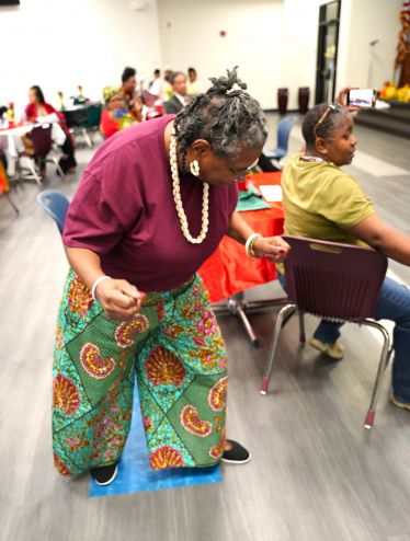 Diverse community members participate in Black History Month event at Pensacola State College.