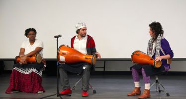 Diverse students perform traditional drums during Black History Month celebration at Pensacola State.