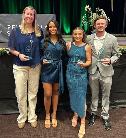 Highly engaged students receiving sports awards at Pensacola State College annual banquet.