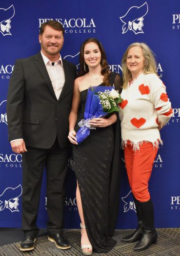 Graduation ceremony with students and family at Pensacola State College.