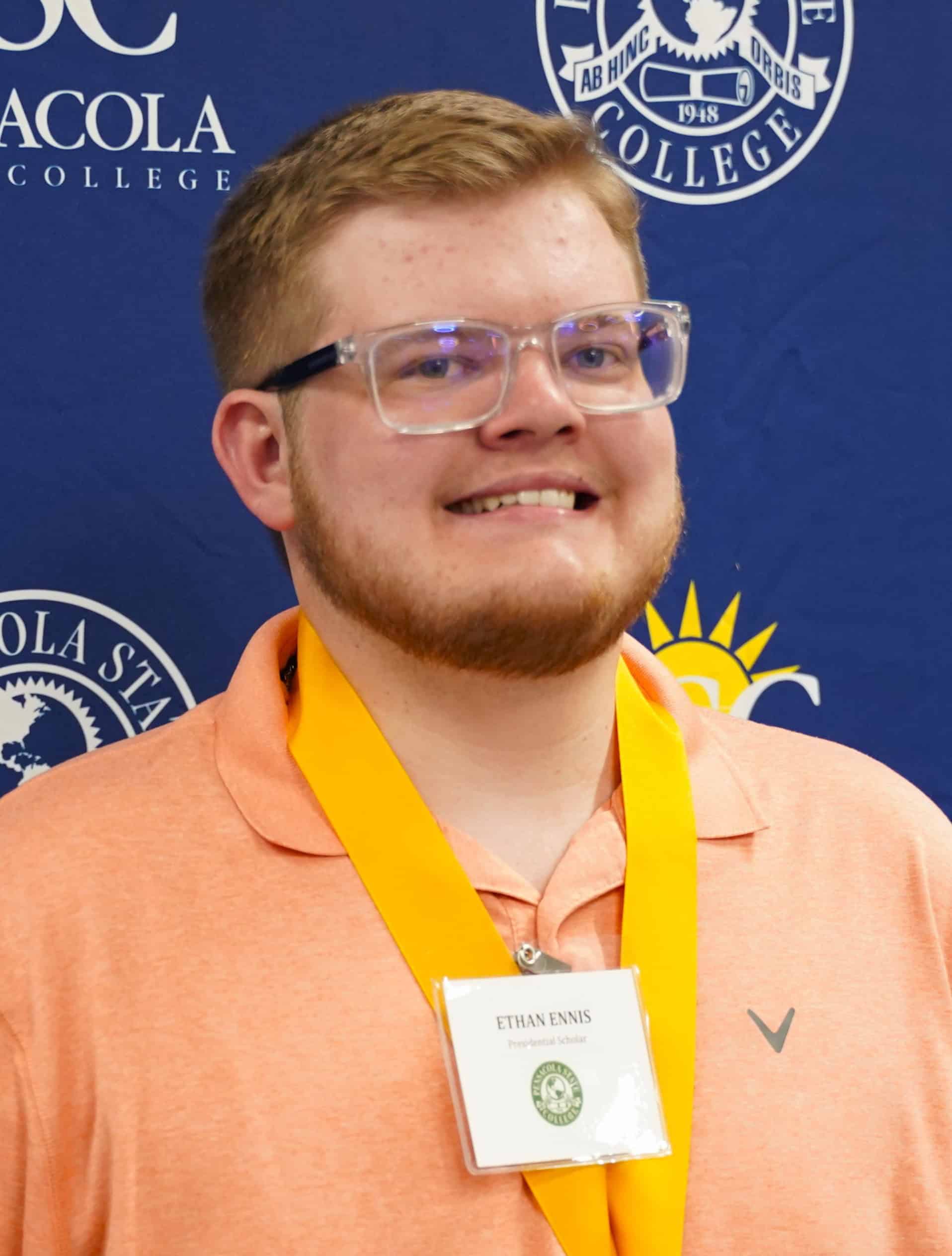 Honors scholar Ethan Ennis wearing a medal at PSC honors reception.