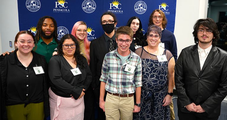 Diverse group of students and faculty celebrating honors and leadership at Pensacola State College e.