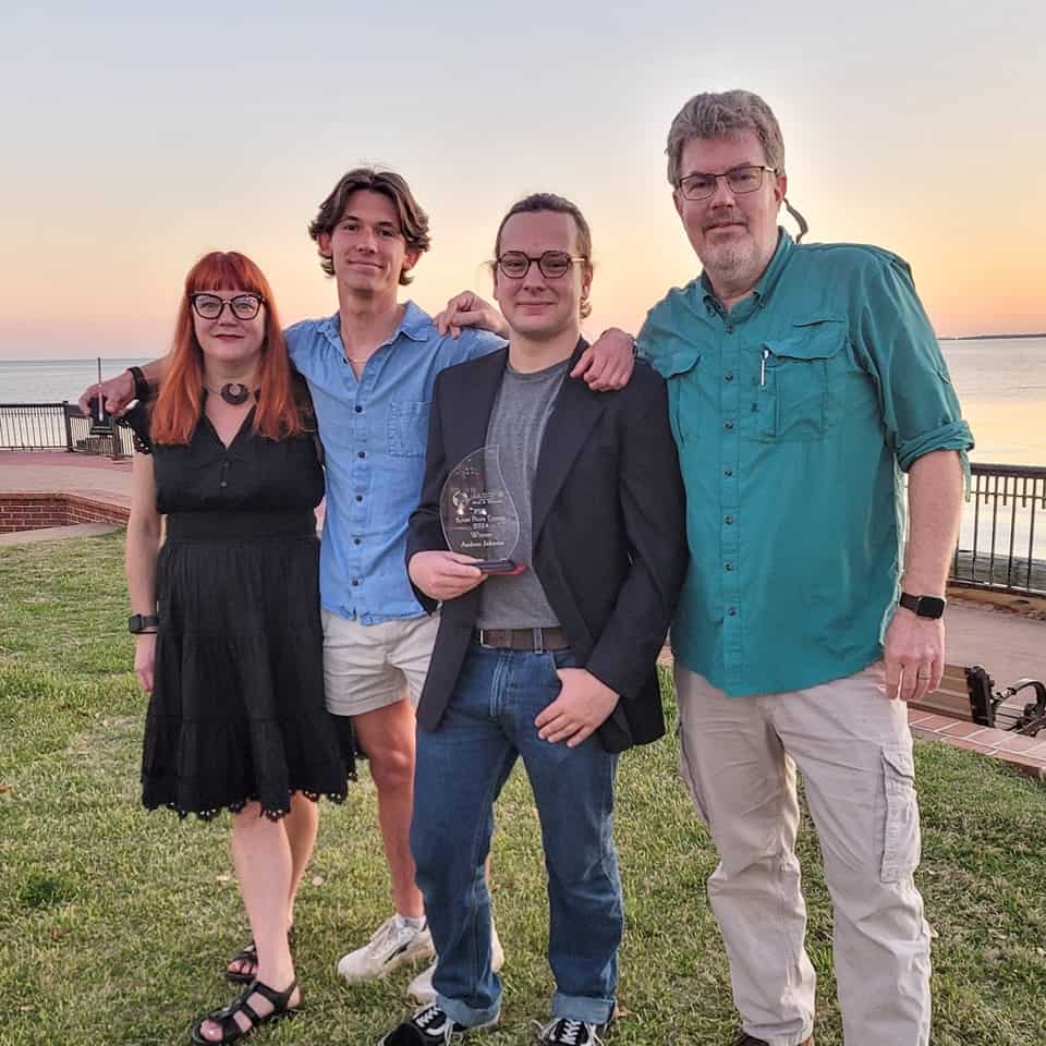 Bright sunset over Pensacola waterfront with award-winning photographers and college faculty.