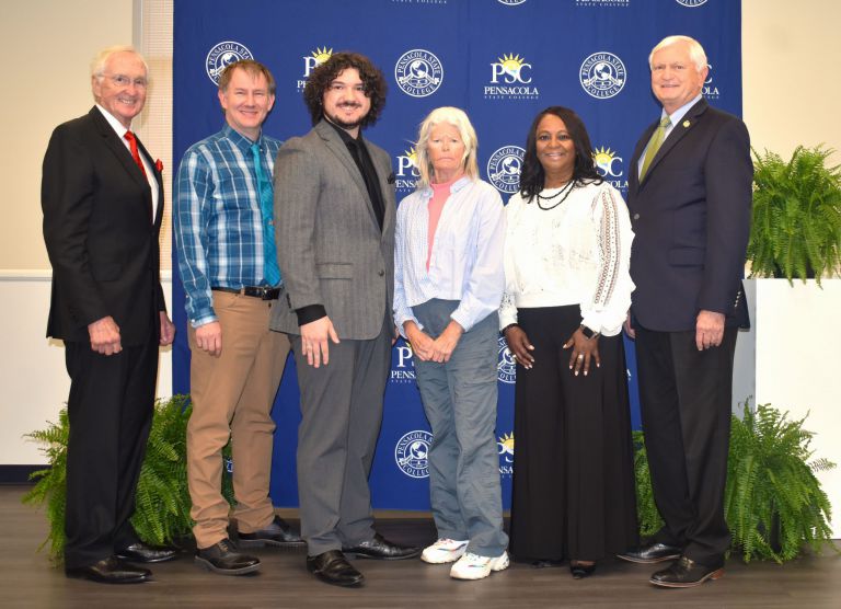 Group photo of PSC faculty and administrators at the Academy of Teaching Excellence induction ceremo.