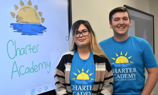 Accessible image showing students at PSC Charter Academy info session.