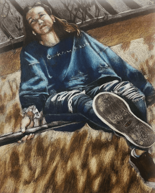 Vibrant portrait of a high school artist displayed at Pensacola State College art exhibit.
