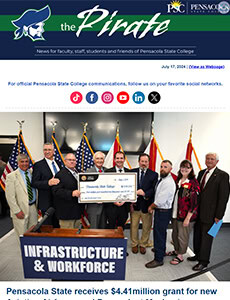 Group of diverse students and officials holding a large check at Pensacola State College event.