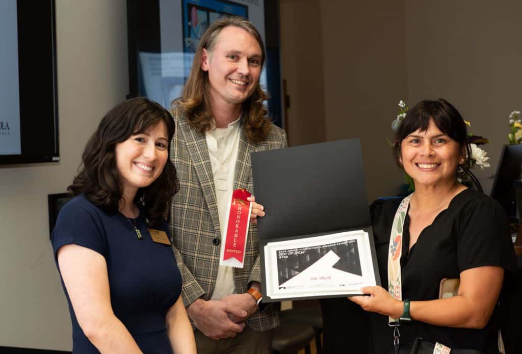 High school artists recognized at Pensacola State College art exhibition for their creative talents.