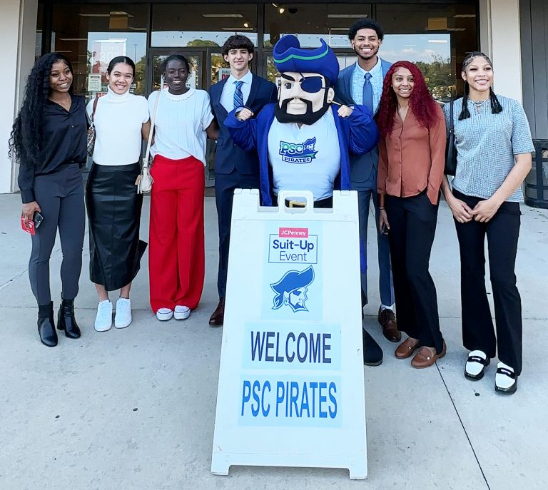 Students gather with PSC mascot for career and technical education awareness.