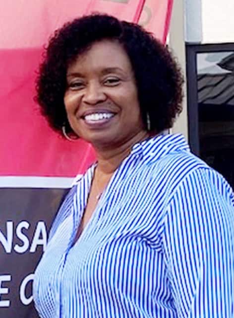 College advisor assisting students with educational opportunities at Pensacola State College.