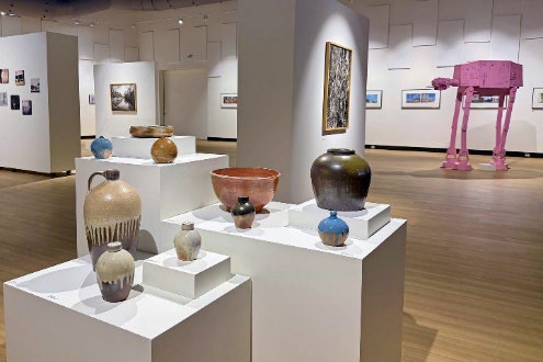 Art exhibition showcasing ceramics and contemporary artwork at PSC.