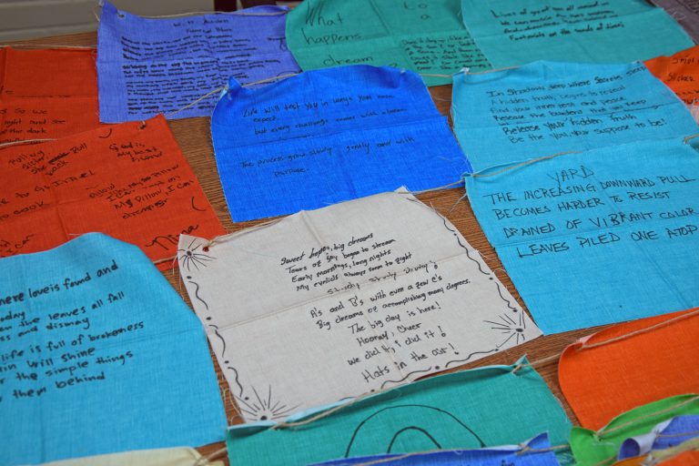 Vibrant colorful paper notes with poetry, music, and inspirational messages for All-American April c.